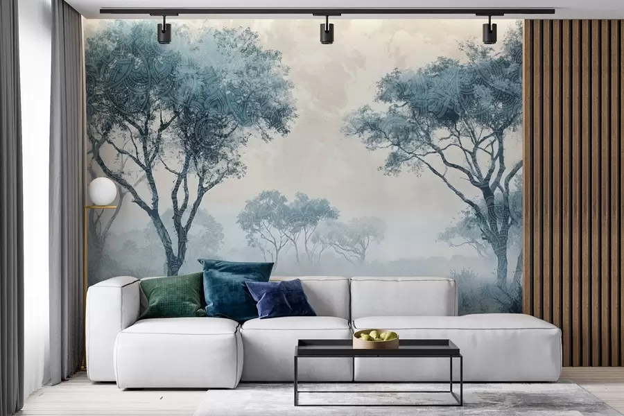 murais de parede Uma paisagem serena e enevoada com árvores em silhueta no primeiro plano e neblina suave em tons de azul e bege w08442