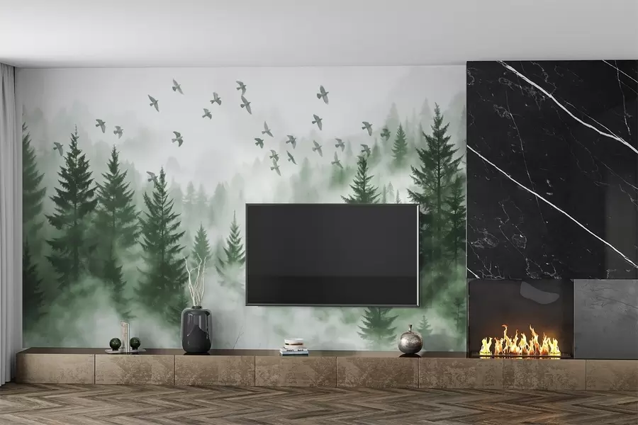 murais de parede Floresta tranquila e enevoada com árvores em tons de verde e um bando de pássaros voando no céu  w08664v1
