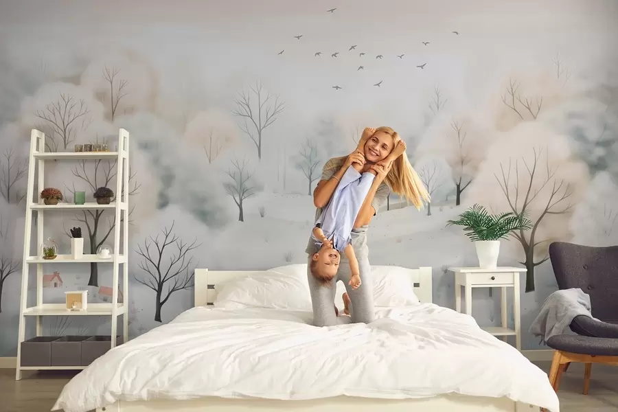 murais de parede Floresta de inverno com árvores, pequenas casas, pássaros e neve em um estilo leve de aquarela w08815